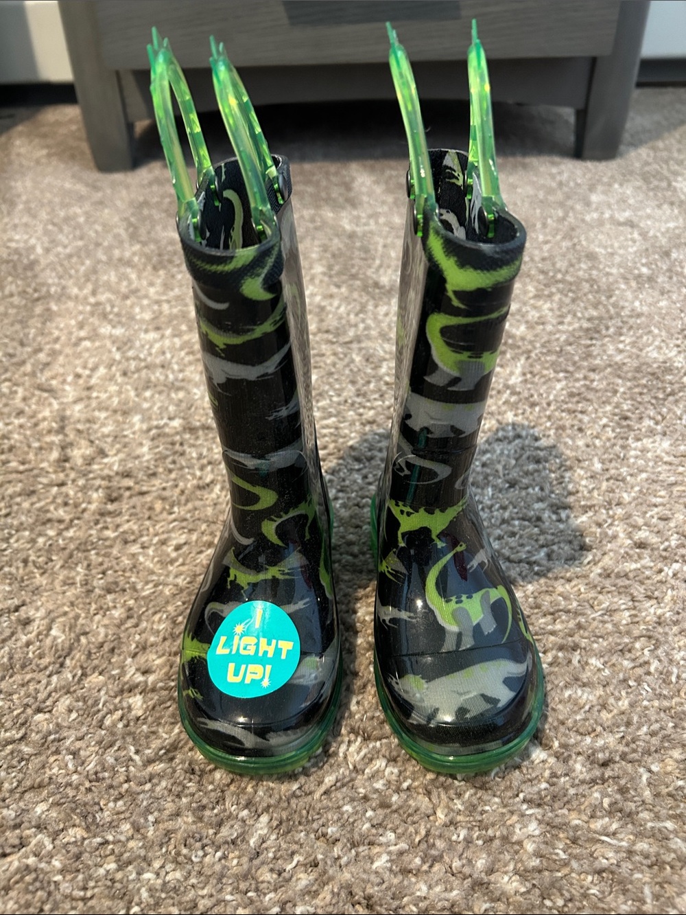 Western Chief Kids Light-Up Rain Boots in Black and Green Camo